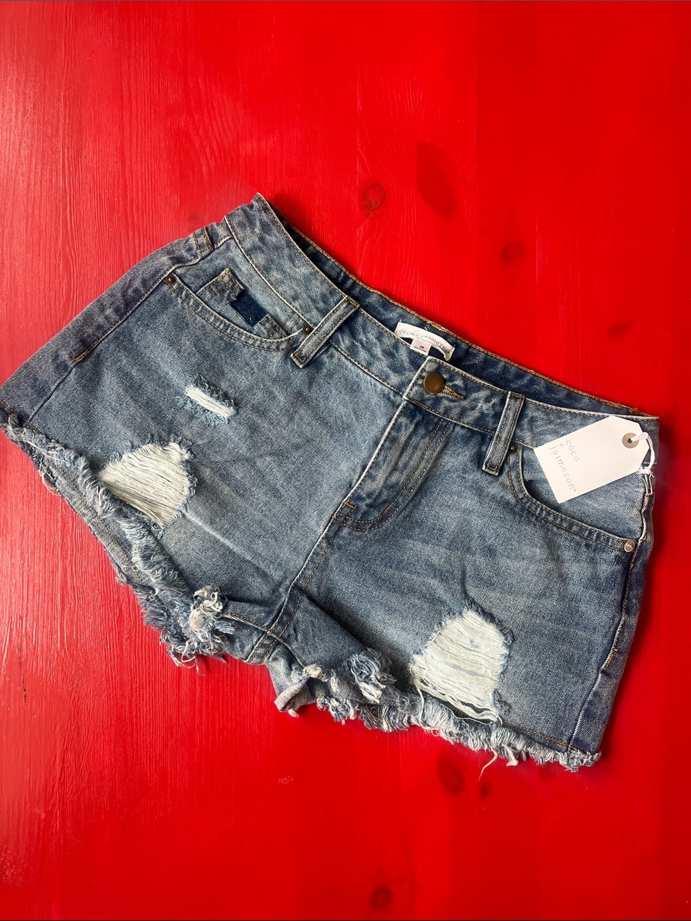 Women’s Distressed Denim Jean Shorts in Blue - Frayed Hem